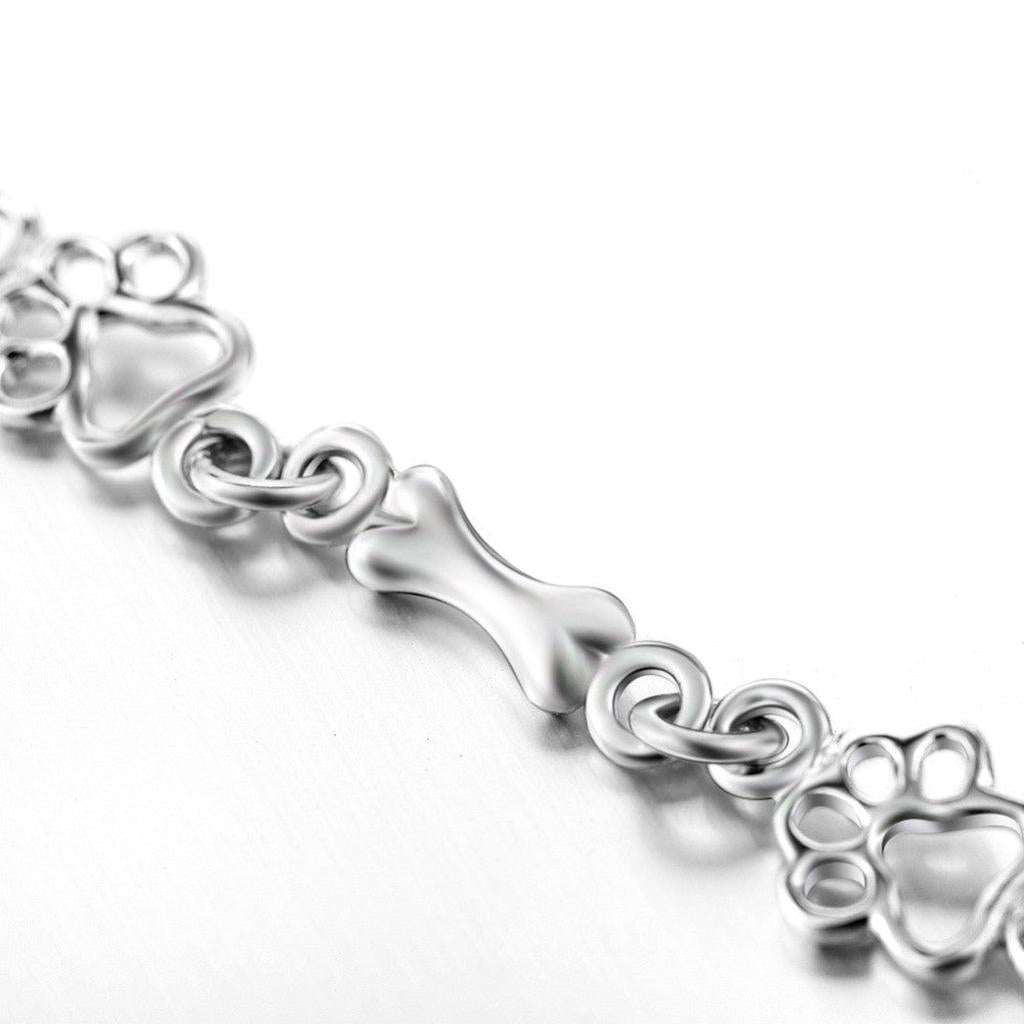 Bracelet with Dog Paw and Bone Pendants in White Gold