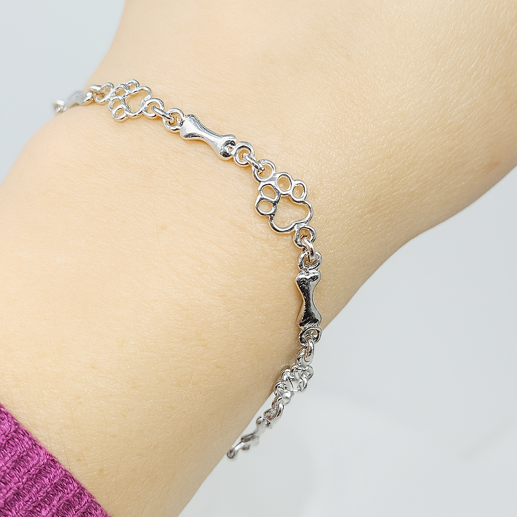 Bracelet with Dog Paw and Bone Pendants in White Gold
