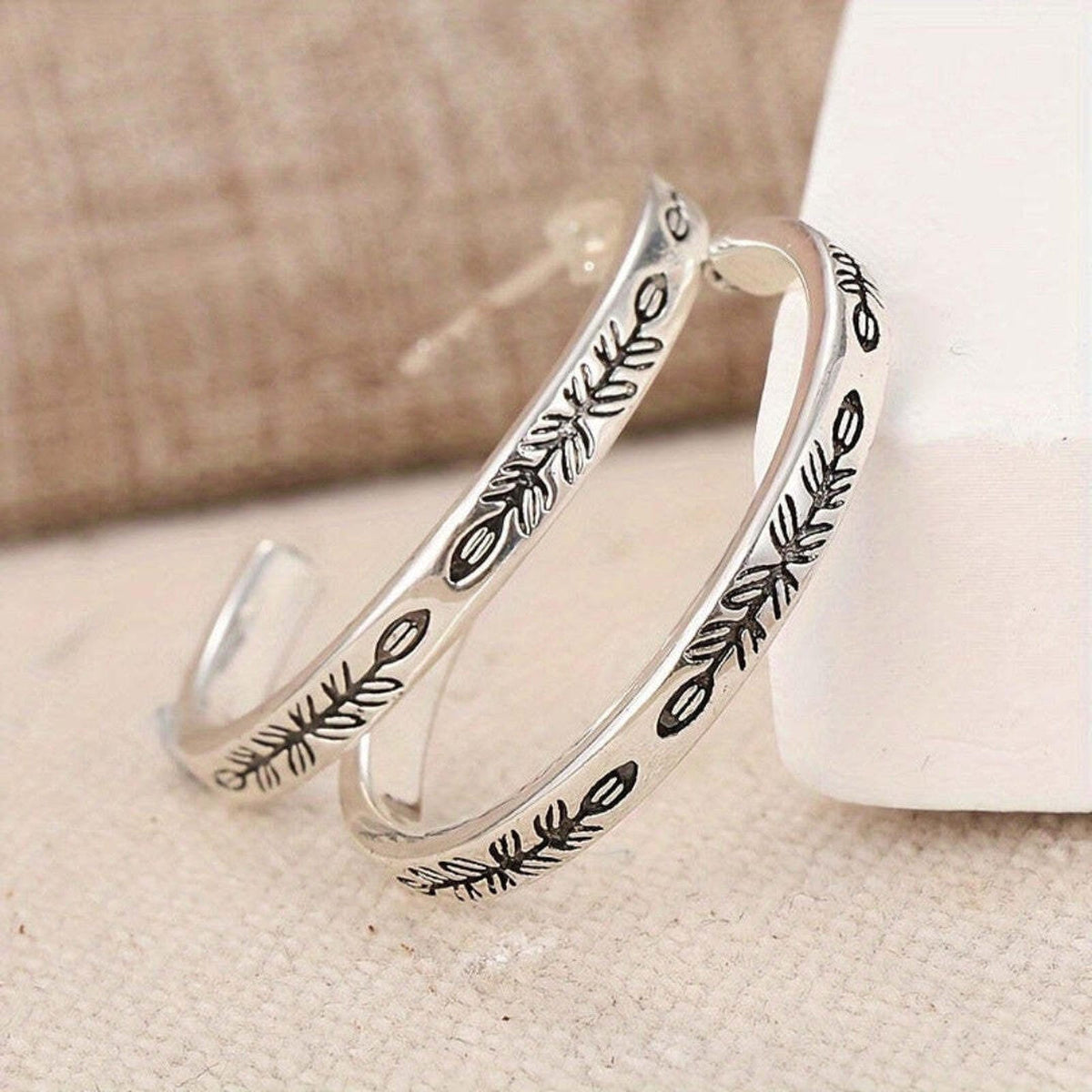 Silver Hoop Earrings with Leaf Pattern