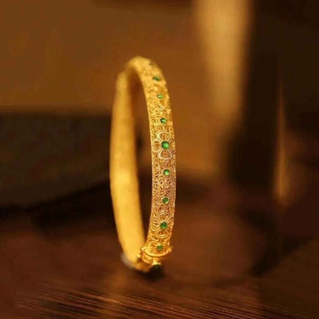Bangle in Ethnic Style with Green Stones and Floral Pattern