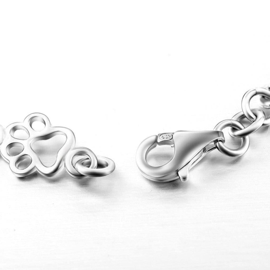 Bracelet with Dog Paw and Bone Pendants in White Gold