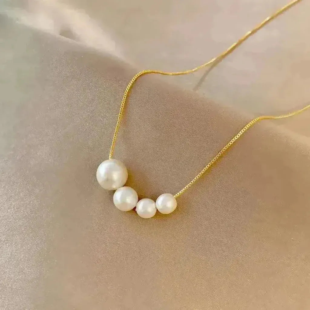 Gold Necklace with Delicate Pearls