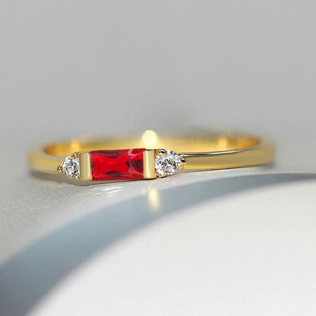 Gold Ring with Red Centre Stone