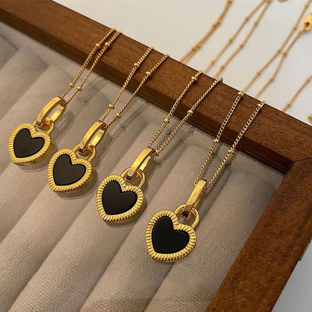 Necklace with Black White Heart Pendant in Gold