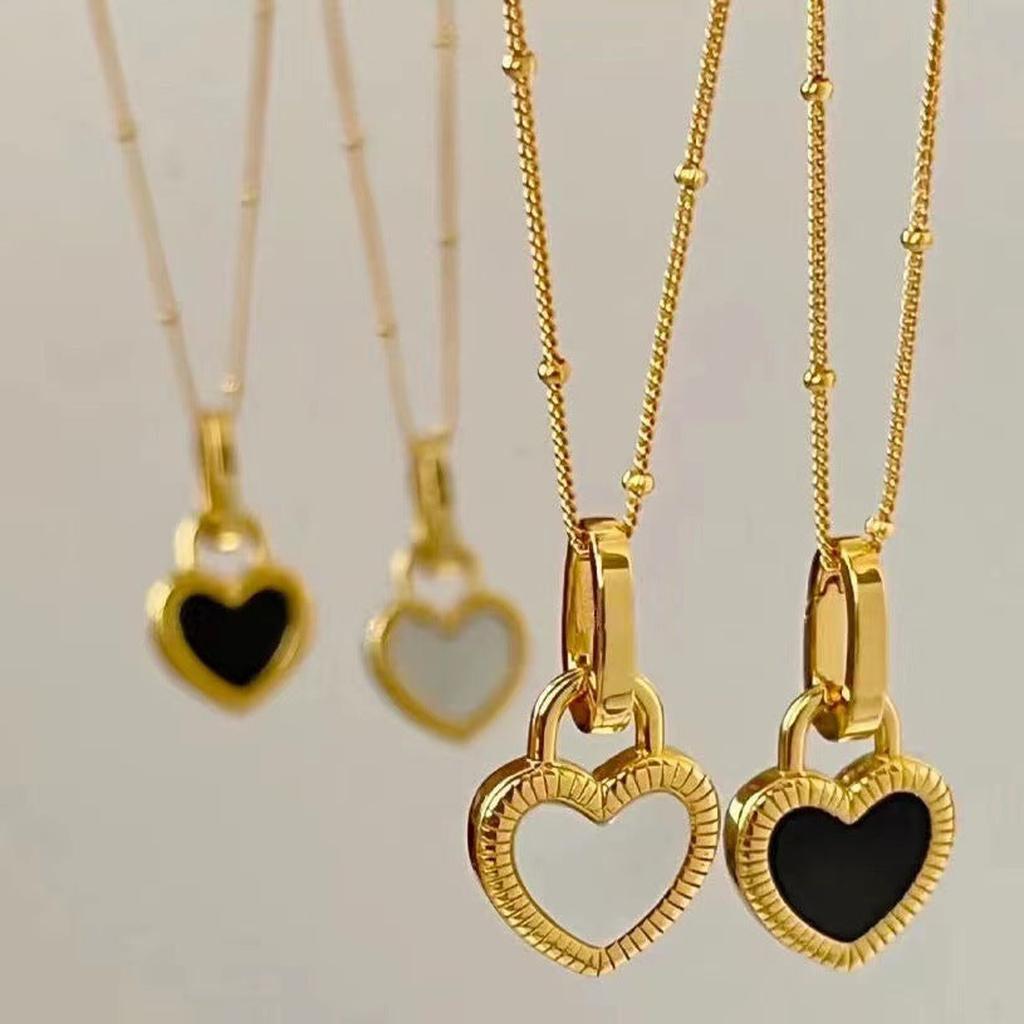 Necklace with Black White Heart Pendant in Gold