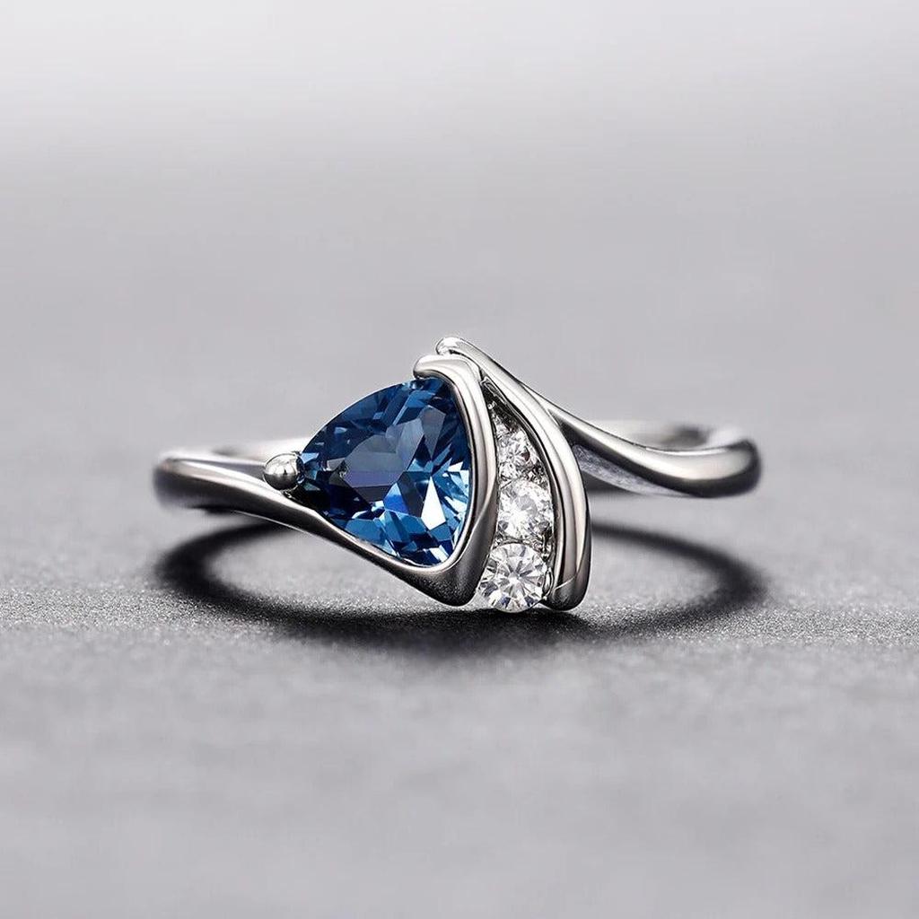 Retro White Gold Ring with Triangular Blue Stone