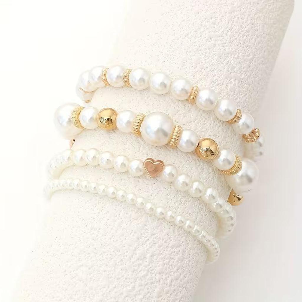 Set of Bracelets with White Pearls