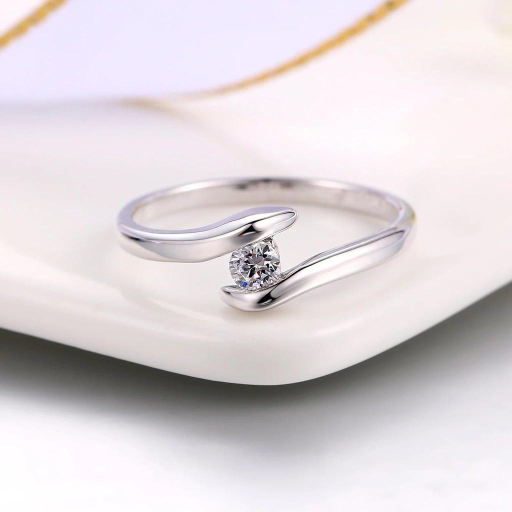 White Gold Ring with Curved Bar and Zirconia
